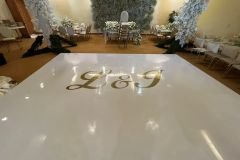 pista-baile-charol-blanco-letras-doradas